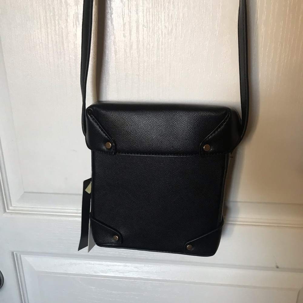 Black rectangle hard boxy purse